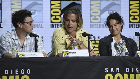 John Francis Daley, from left, Chris Pine and Michelle Rodriguez attend a panel for "Dungeons and Dragons: Honor Among Thieves" on day one of Comic-Con