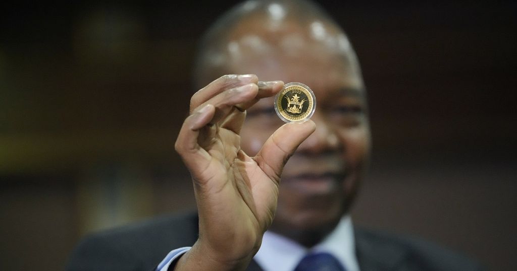 To stem inflation, Zimbabwe debuts gold coins as legal tender