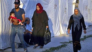 عائلات سورية تعود إلى مخيم للاجئين في بلدة بر الياس في سهل البقاع، لبنان، 7 يوليو / تموز 2022