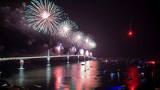 Fireworks illuminate skies over the newly built Peljesac Bridge in Komarna, southern Croatia, Tuesday, July 26, 2022.