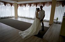 Yevhen Levchenko and Nadiia Prytula get married in Irpin, on the outskirts of Kyiv, Ukraine, June 21, 2022.