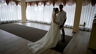 Yevhen Levchenko and Nadiia Prytula get married in Irpin, on the outskirts of Kyiv, Ukraine, June 21, 2022.