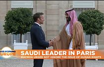 French President Emmanuel Macron greets the Saudi Crown Prince