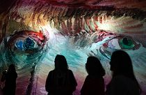 Visitors attend the press presentation of the immersive exhibition of Dutch artist Vincent Van Gogh.