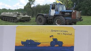 کشیدن تانک به غنیمت گرفته شده از سوی اوکراینی‌ها و تمبری که برای این حرکات منتشر شده است