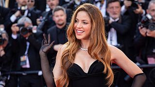 Shakira poses for photographers upon arrival at the premiere of the film 'Elvis' at the 75th international film festival, Cannes, southern France, Wednesday, May 25, 2022.