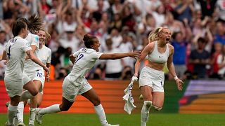England's Chloe Kelly, right, celebrates after scoring her side's second goal during the Women's Euro 2022 final