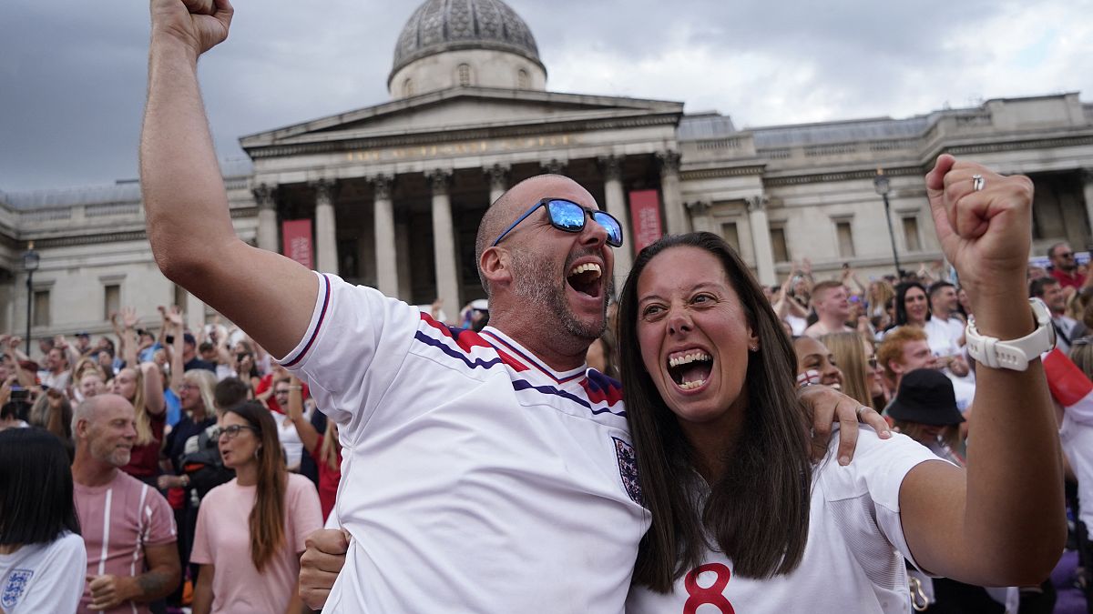 Supporters react to England's win in Trafalgar Square