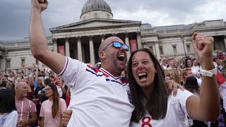 Supporters react to England's win in Trafalgar Square