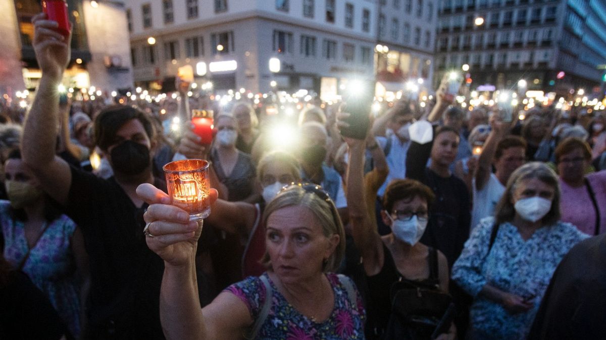 A candlelit memorial for Lisa-Maria Kellermayr, the deceased doctor who reported receiving threats from opponents of COVID-19 restrictions and vaccines, Vienna, Aug. 1, 2022.