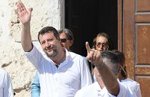 Matteo Salvini and Leader of The League party, leaves the town hall building during his visit in the Sicilian Island of Lampedusa, Italy (AP Photo/David Lohmueller))