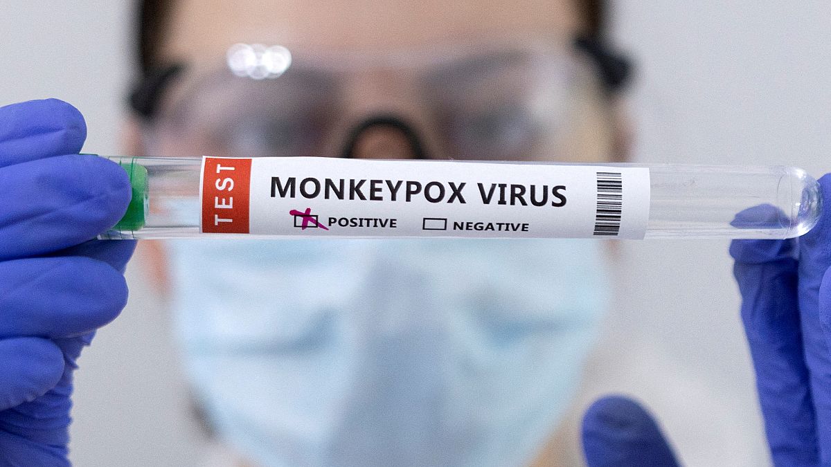 Test tubes labelled "Monkeypox virus positive" are seen in this illustration taken May 23, 2022
