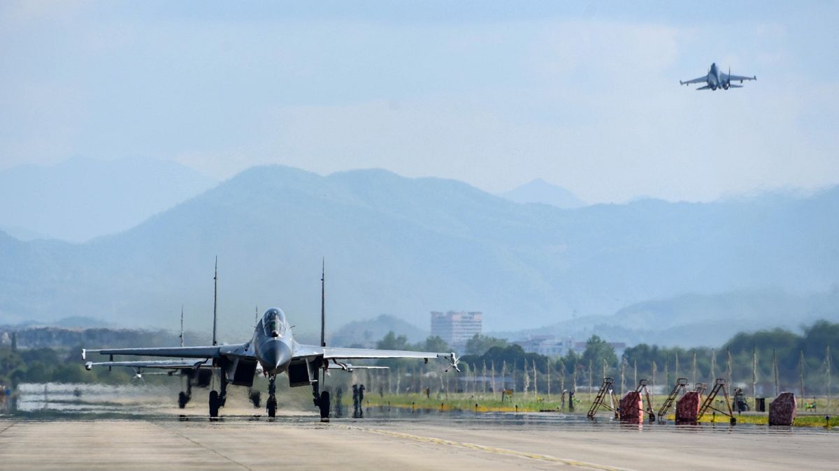 Air force and naval aviation corps of the Eastern Theatre Command of the Chinese People's Liberation Army fly planes at an unspecified location in China, Aug. 4, 2022.