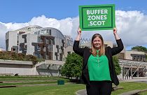 FILE - Green MSP Gillian Mackay stands outside the Scottish Parliament, Holyrood, in Edinburgh