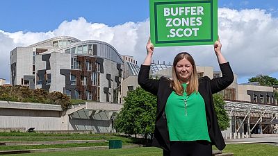 FILE - Green MSP Gillian Mackay stands outside the Scottish Parliament, Holyrood, in Edinburgh