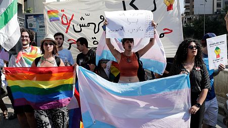 Activists from the LGBTQ+ community in Lebanon shout slogans as they march calling on the government for more rights in the country gripped by economic and financial crisis.