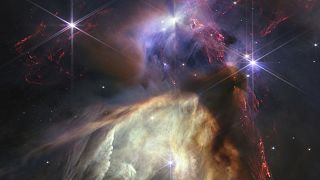A picture from James Webb Telescope showing the birth of a star as never seen before. The subject is the Rho Ophiuchi cloud complex, the closest star-forming region to Earth.