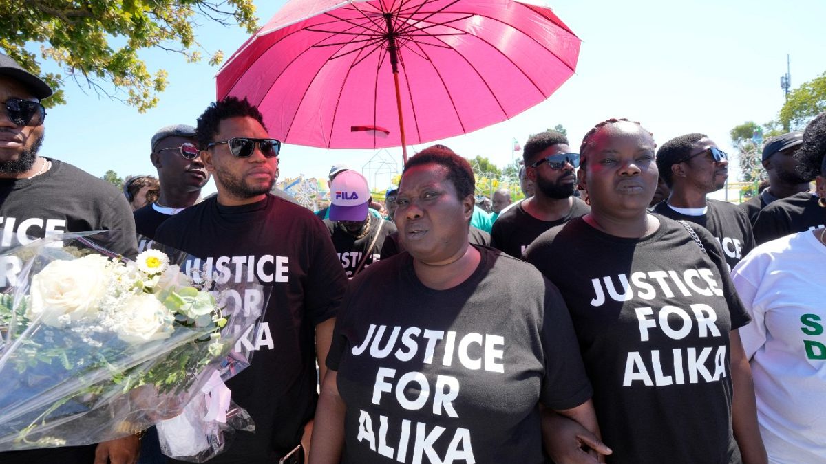 Protesters gather during a demonstration to demand justice for Nigerian street vendor Alika Ogorchukwu in Civitanova Marche, Italy, Saturday, Aug. 6, 2022.