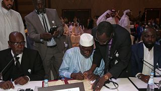 Unterzeichnung des Abkommens in Doha