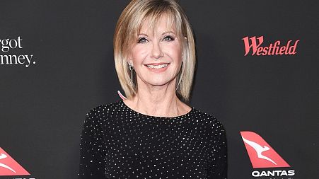 FILE - In this Jan. 27, 2018 file photo, Olivia Newton-John attends the 2018 G'Day USA Los Angeles Gala at the InterContinental Hotel Los Angeles.