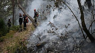 Firefighters have started "tactical fires" to prevent the flames from spreading.