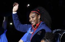 Serena Williams waves before a Fed Cup qualifying tennis match in February 2020.