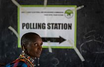 A Maasai woman waits to cast her vote at a polling station in Esonorua Primary School, in Kajiado County, Kenya Tuesday, Aug. 9, 2022.