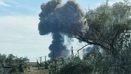 Smoke rises after explosions were heard from the direction of a Russian military airbase near Novofedorivka, Crimea August 9, 2022.