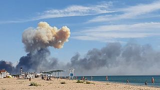 Smoke rises after explosions were heard from the direction of a Russian military airbase near Novofedorivka, Crimea August 9, 2022.