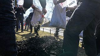 Polish coal miners attend a protest to demand Germany to stop importing Russian coal oil and gas in front of the German Embassy in Warsaw, March 24, 2022