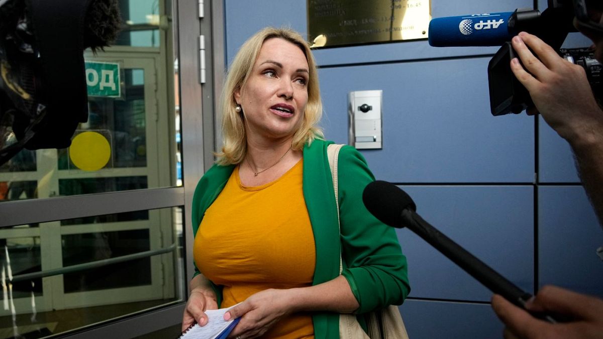 Marina Ovsyannikova arrives for a court hearing in Moscow on July 28.