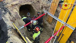 The man was trapped under several metres of earth for around eight hours.