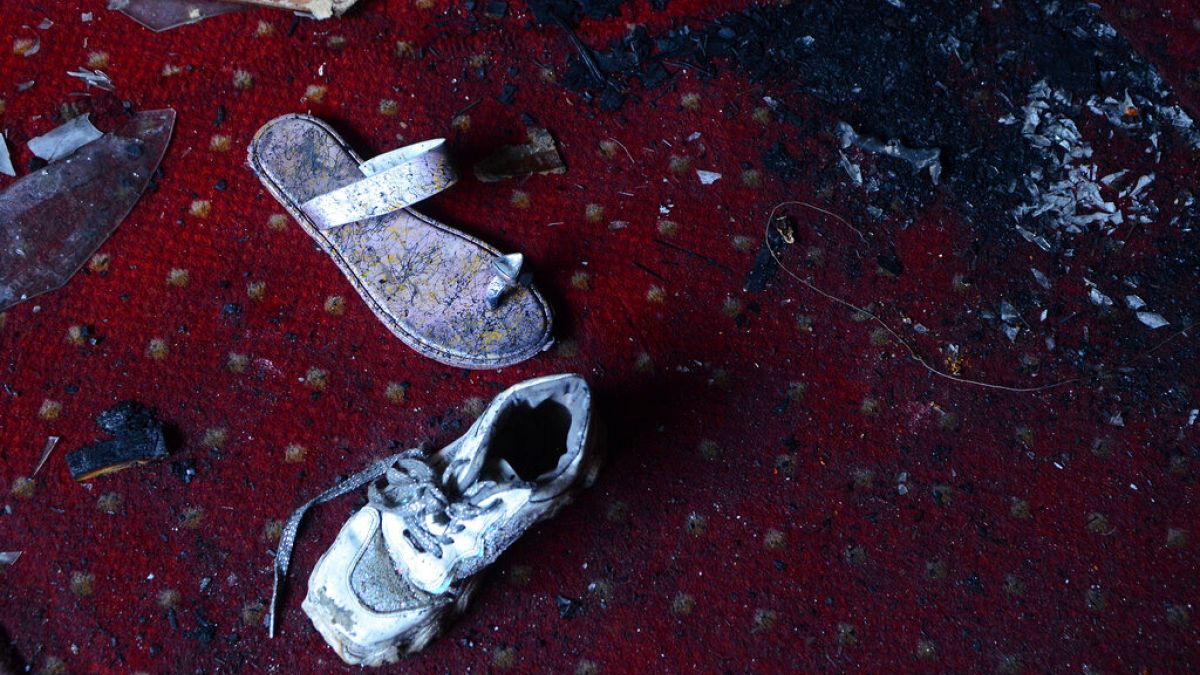Abandoned shoes remain at the site of a fire inside the Abu Sefein Coptic church that killed at least 41 people on Sunday. 