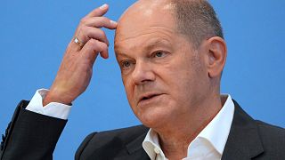 FILE: German Chancellor Olaf Scholz addresses the media during his first annual summer news conference in Berlin, Germany, Thursday, Aug. 11, 2022.