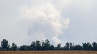 A view shows smoke rising above the area following an alleged explosion in the village of Mayskoye in the Dzhankoi district, Crimea, August 16, 2022.