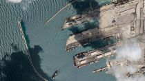 satellite image from Planet Labs PBC shows the Sierra Leone-flagged cargo ship Razoni, at port in Tartus, Syria Monday, Aug. 15, 2022