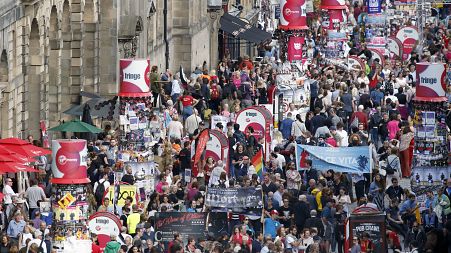 Crowds mingle on Edinburgh's Royal Mile during the 2016 Edinburgh Fringe Festival