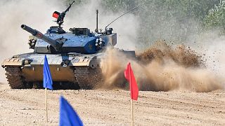 The Chinese team's Type 96B tank takes part in the tank biathlon at the International Army Games near Moscow, 14 August 2022