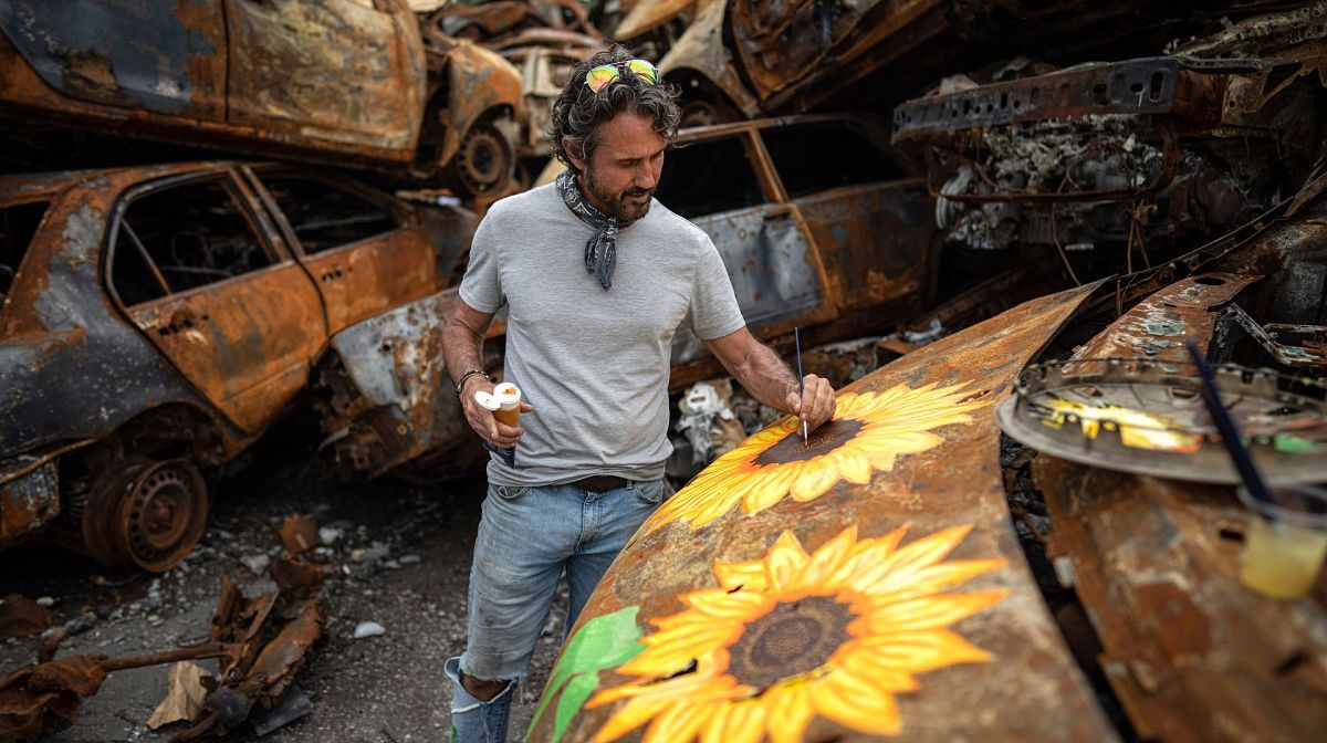 Flowers For Hope Artists Paint Sunflowers On Destroyed Vehicles In War   1200x672 Cmsv2 23ad6e29 6d04 5618 9157 D29c07718cce 6950032 