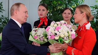 بوتين خلال احتفالات يوم المرأة في موسكو
