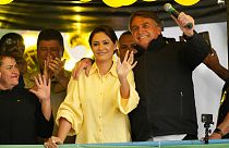 Президент Бразилии Жаир Болсонару с супругой Мишель во время предвыборного ралли в городе Жуис-ди-Фора. 16 августа 2022.