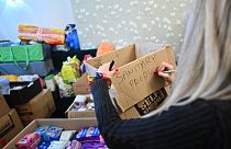 A volunteer in south London collects goods to be sent for Ukrainian refugees