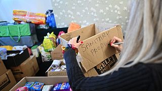 A volunteer in south London collects goods to be sent for Ukrainian refugees