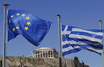 Флаги Евросоюза и Греции развеваются на фоне Акрополя. Афины, Греция. 5 июля 2015.