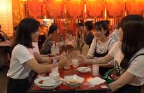 A group of women enjoying an evening out in a restaurant in Tokyo, Japan.