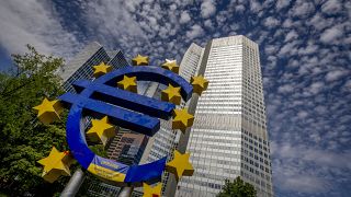 The Euro sculpture stands in front of the former European Central Bank in Frankfurt, Germany, July 13, 2022. 