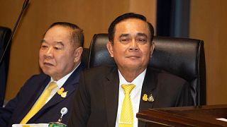 Thailand's Prime Minister Prayuth Chan-ocha, right, Deputy Prime Minister Prawit Wongsuwan