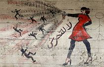 لوحة جدارية مكتوب عليها "لا مضايقة" على حائط في القاهرة، مصر، في 24 مايو / أيار 2013