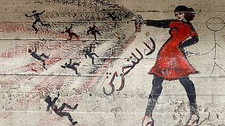 لوحة جدارية مكتوب عليها "لا مضايقة" على حائط في القاهرة، مصر، في 24 مايو / أيار 2013