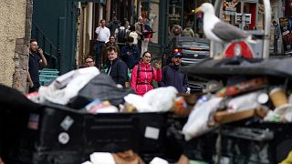 A view of overflowing bins in Edinburgh where city council workers are on the fourth day of strike action (24 August 2022)